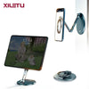 A foldable magnetic phone and tablet stand with a sleek design shown next to a smartphone and a circular base.