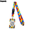 Buntes Puzzle-Teil-Lanyard mit Hand in Autism-Design an einem Schlüsselring