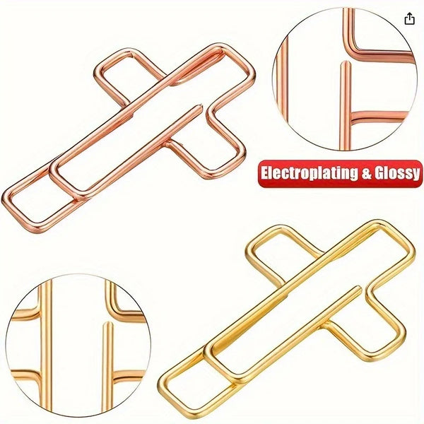 Two decorative paper clips, one rose gold and one gold tone, shown with close-ups of the finish.