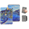 A blue watercolor illustration of a waterfront city scene on a leather case for a Kindle Paperwhite.