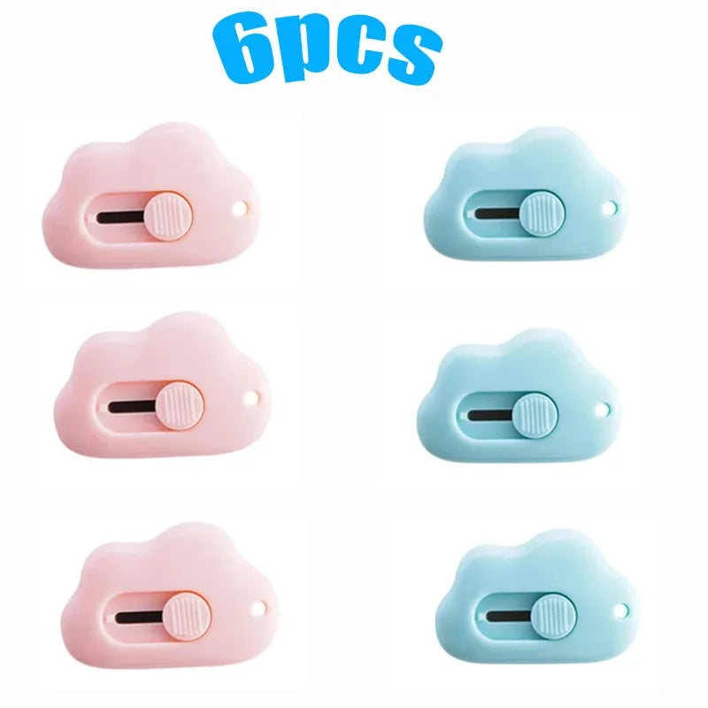 A set of six multi-color rabbit cloud utility knives in pink and light blue.
