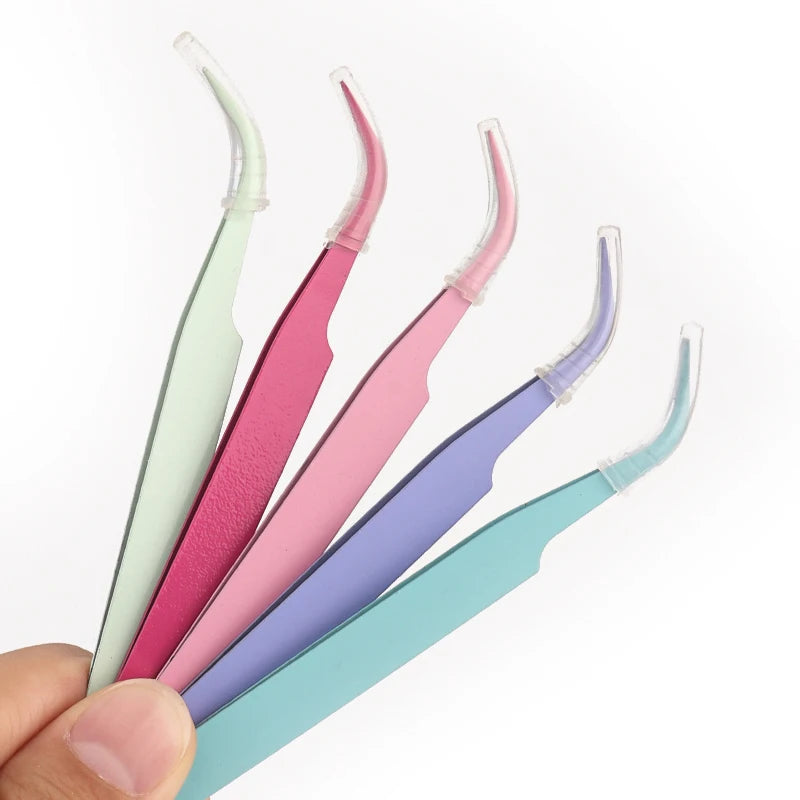 A set of five precision tweezers in various pastel colors for nail art and eyelash extensions