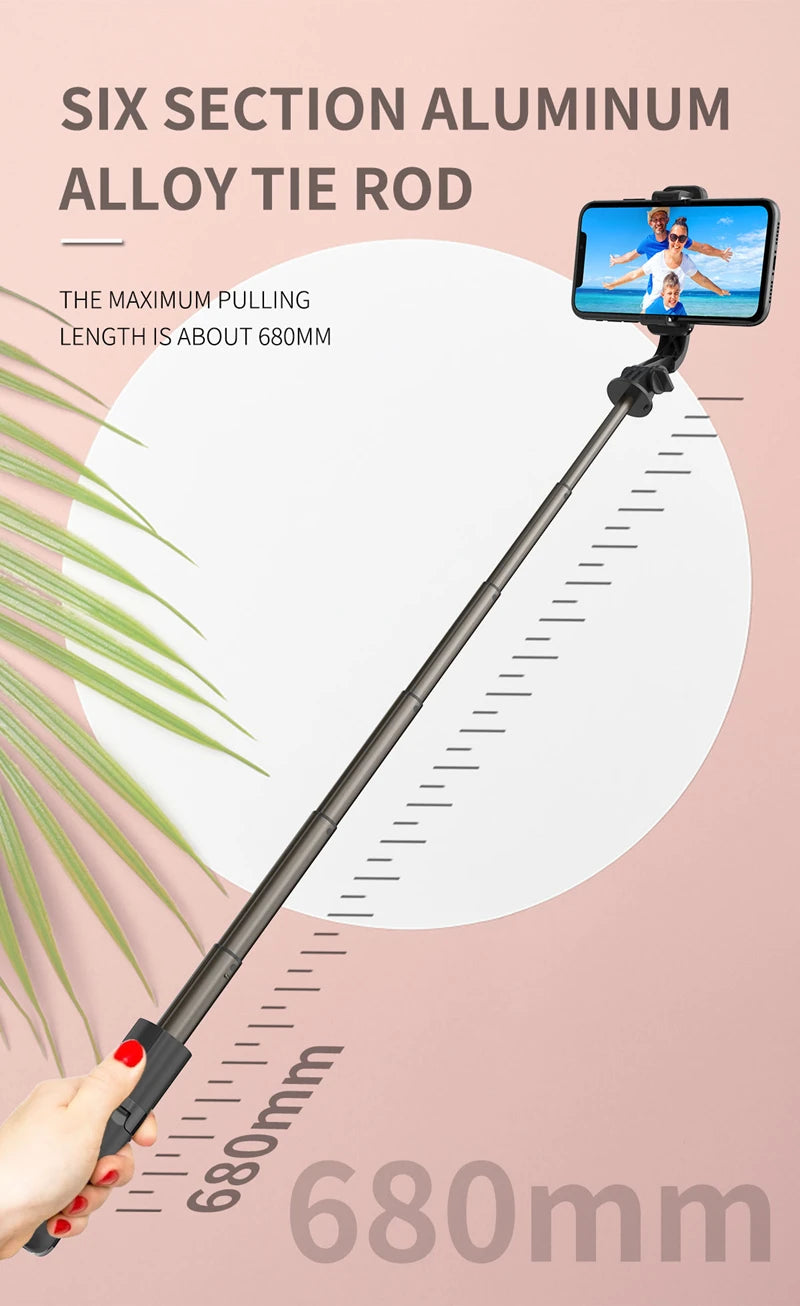 A silver aluminum alloy tie rod selfie stick with a smartphone attached, demonstrating its 680mm length.