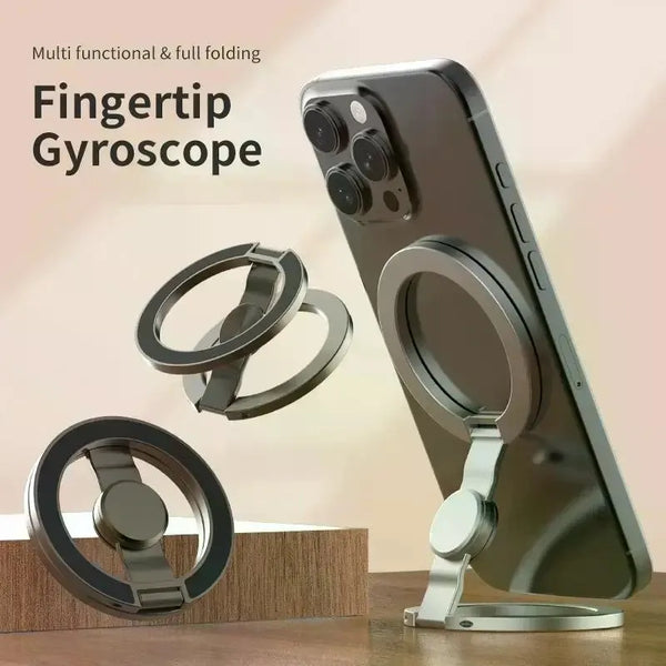 A silver dual magnetic phone stand and fidget spinner accessory shown next to a smartphone.