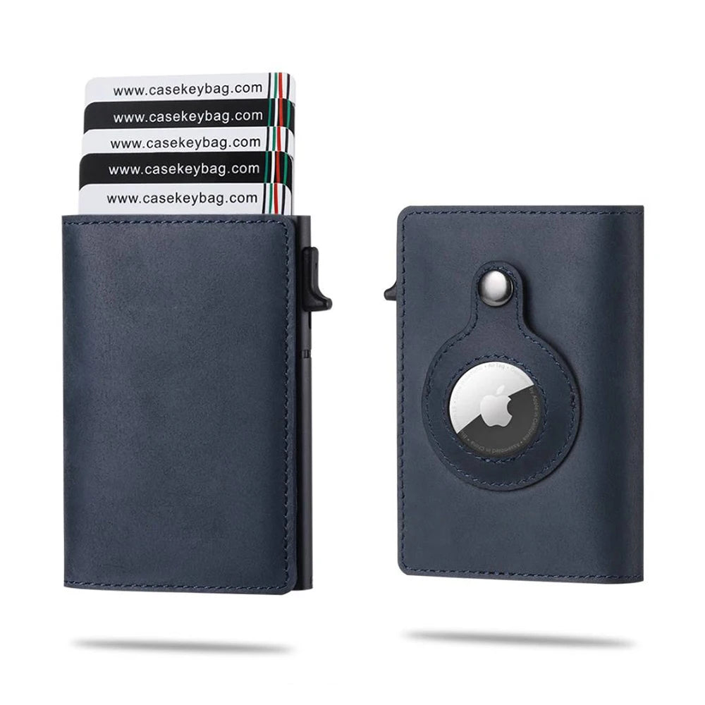 A dark blue slim leather wallet with a card pop-up feature shown next to a stack of similar wallets.