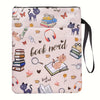 A pink fabric book sleeve featuring illustrations of cats, books, and reading accessories like glasses and headphones.