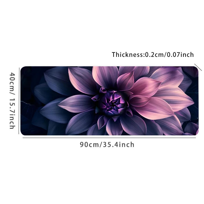 A close-up of a purple and pink lotus flower design on a dark mouse pad.