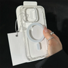 A clear magnetic phone case for an iPhone is shown being held by a hand against a white card.