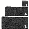 Black abstract desk mat with white contour lines for gaming and office use
