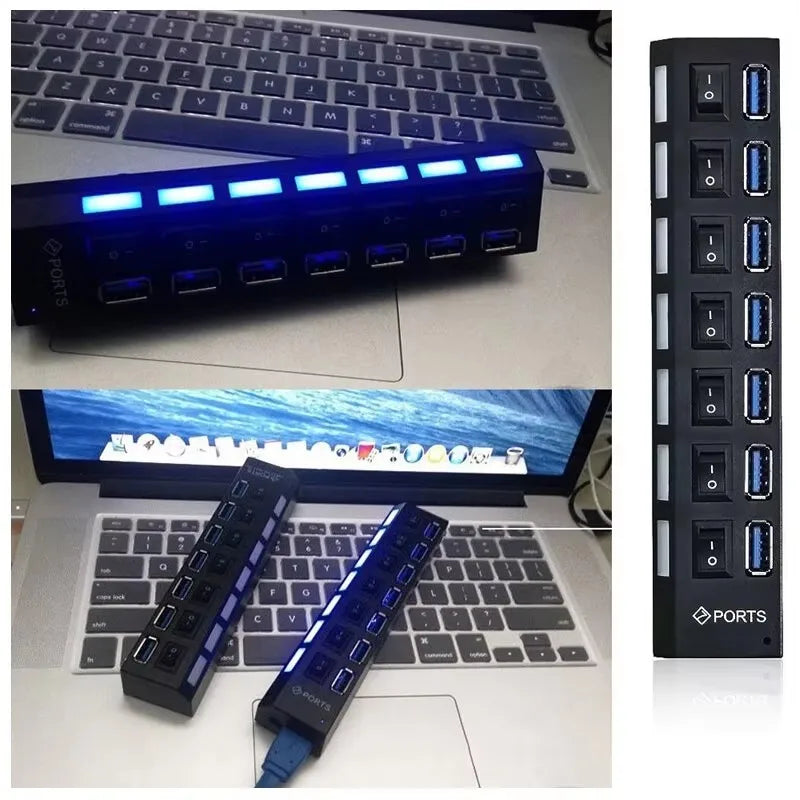 A black 7-port USB 2.0 hub splitter is shown connected to a laptop and a desktop computer setup.