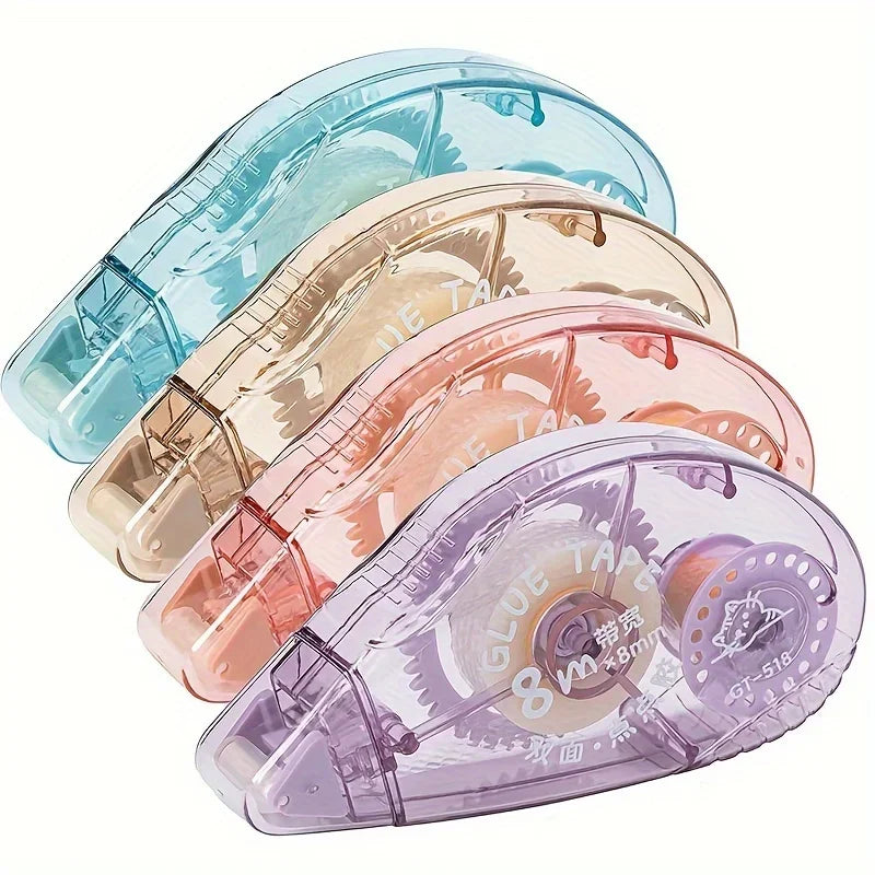Three rolls of double-sided adhesive tape in various translucent colors are displayed.