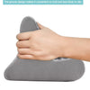 A hand is holding a gray, ergonomic grip designed for a multi-angle adjustable tablet and phone holder.