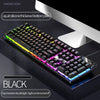 A close-up view of a black mechanical keyboard with colorful LED lighting and a liquid silicone thickened bottom plate.