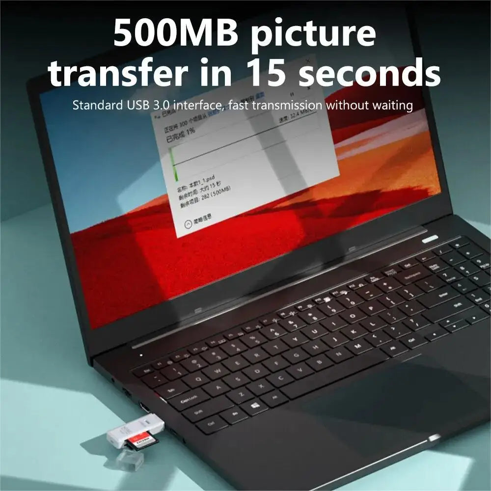 A laptop displaying a transfer speed graphic, next to a USB 3.0 card reader and flash drive.