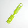 A bright lime green durable PVC luggage tag with a hook shape for travel identification.