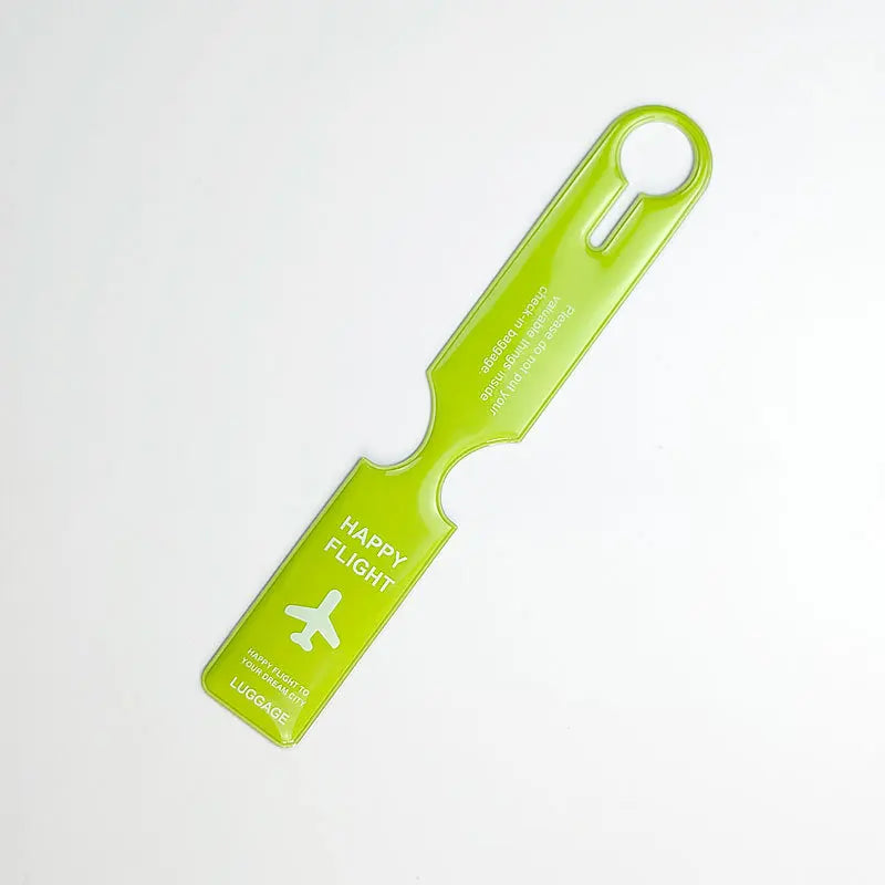 A bright lime green durable PVC luggage tag with a hook shape for travel identification.