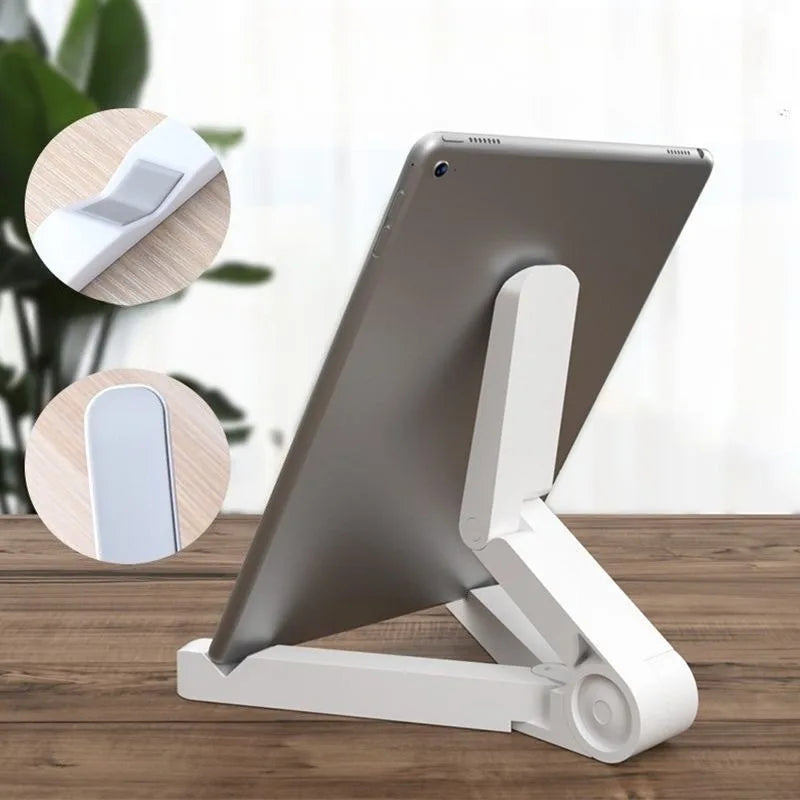 A gray foldable adjustable tablet stand is shown with inset circles demonstrating its use for various devices.