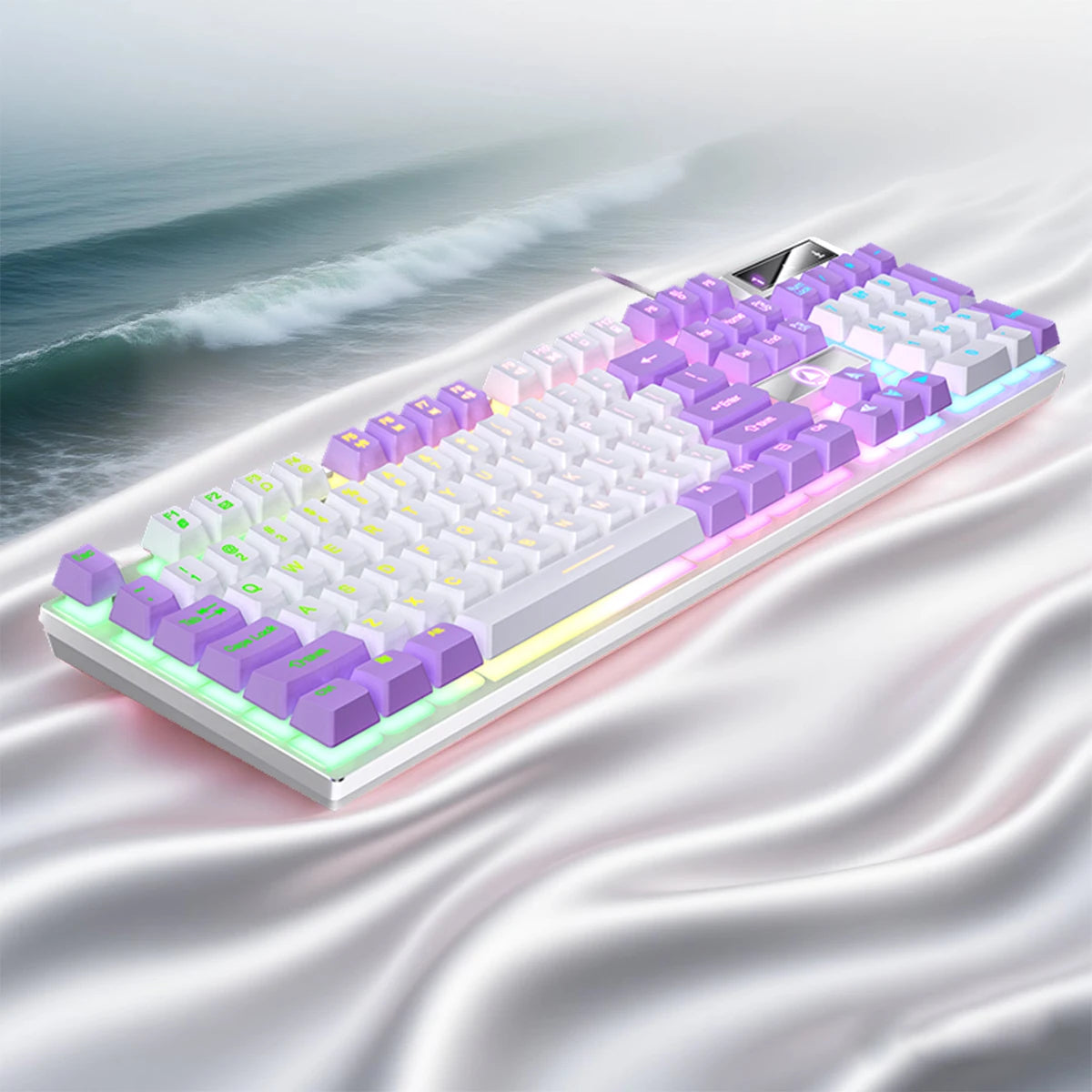 Low profile wired gaming keyboard with a numeric keypad shown from above on a wavy surface.