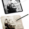 A matte PET screen protector film is shown being used to draw on a piece of paper.
