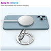 A magnetic ring buckle phone holder stand is shown resting on a light blue iPhone.