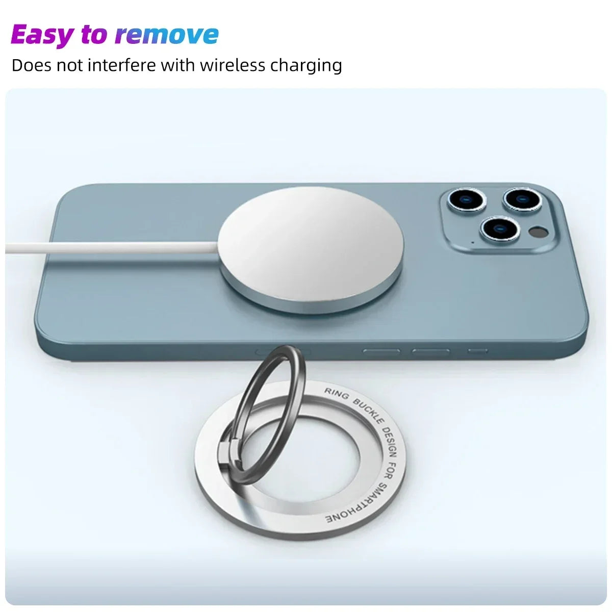 A magnetic ring buckle phone holder stand is shown resting on a light blue iPhone.
