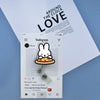 A white badge reel featuring a cute Miffy rabbit design on an ID card holder.