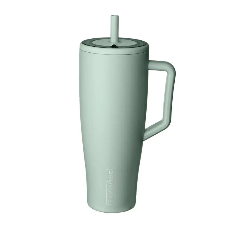 A light mint green Brümate Era 40 oz insulated tumbler with a lid, handle, and straw.