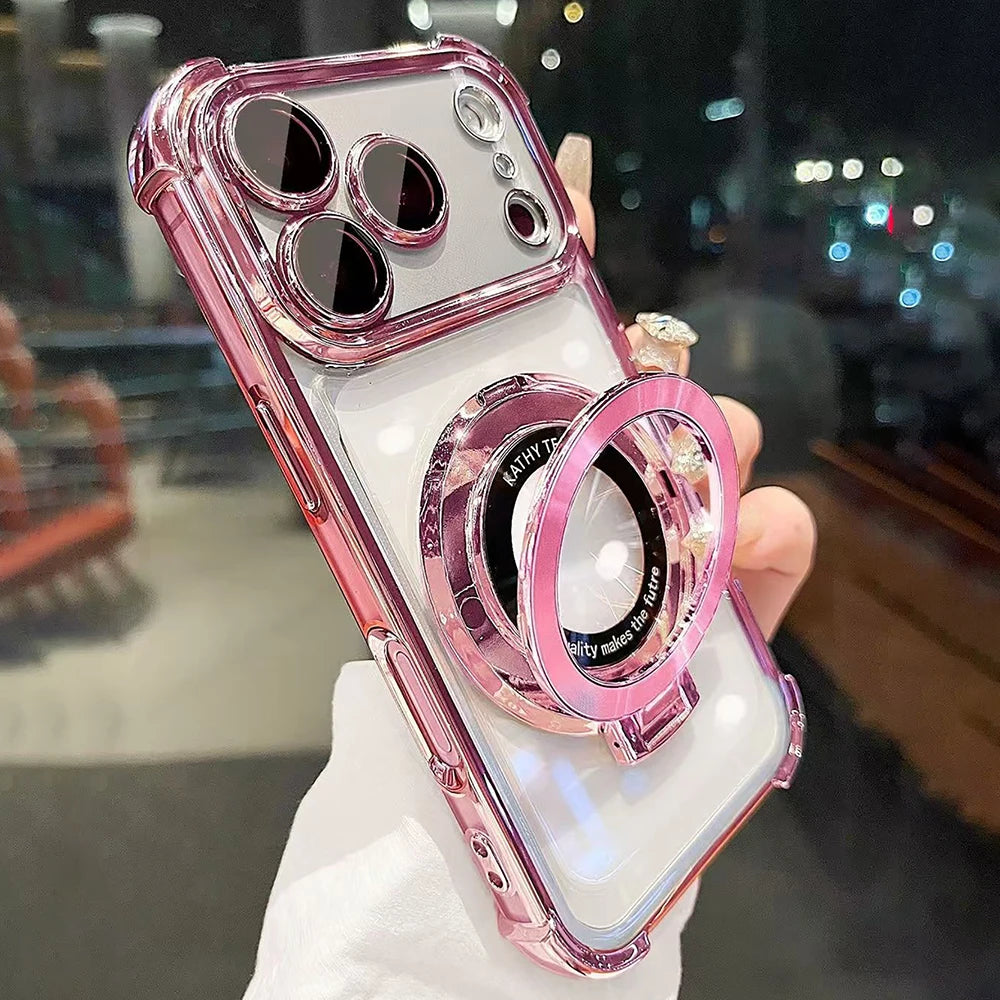A pink iPhone magnetic stand case with lens protection and a kickstand is held in a hand.