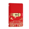 A red personal finance budget binder with a gold lock and intricate traditional Chinese patterns on the cover.