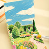 A sheet of 200g drawing paper featuring a colorful landscape painting with trees, flowers, and a winding path.