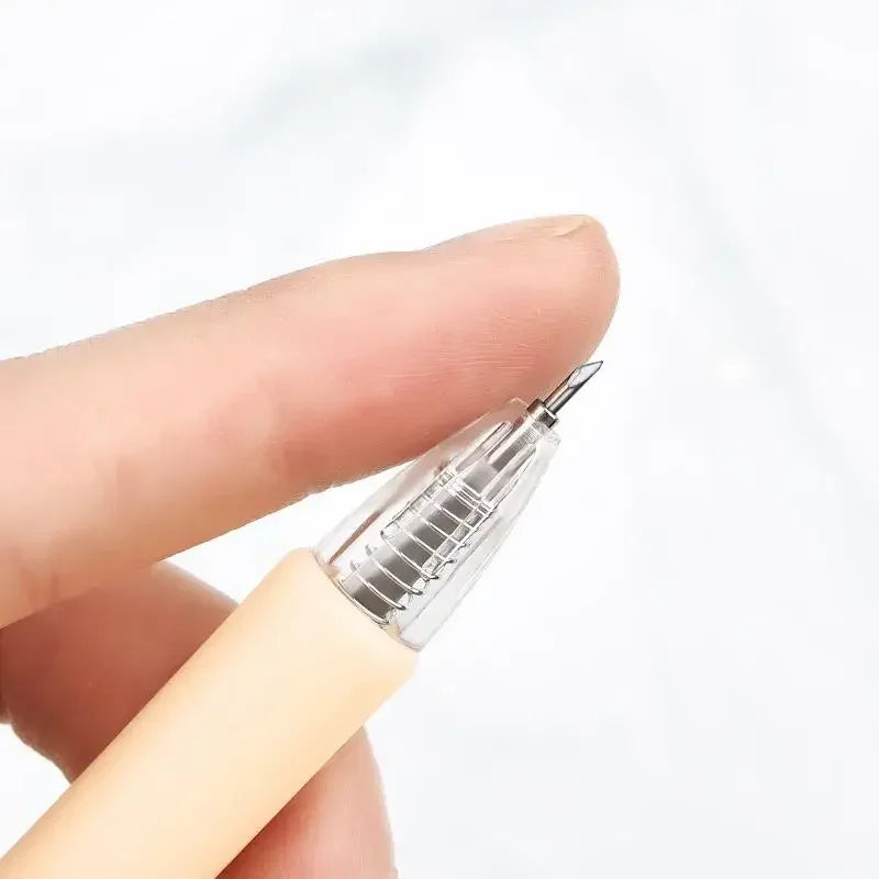 A hand holds a precision craft knife set with a silver blade and beige handle.