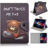 A dark gray leather folio case with a printed design of a bear and the text Don't Touch My Pad, shown alongside an open versi