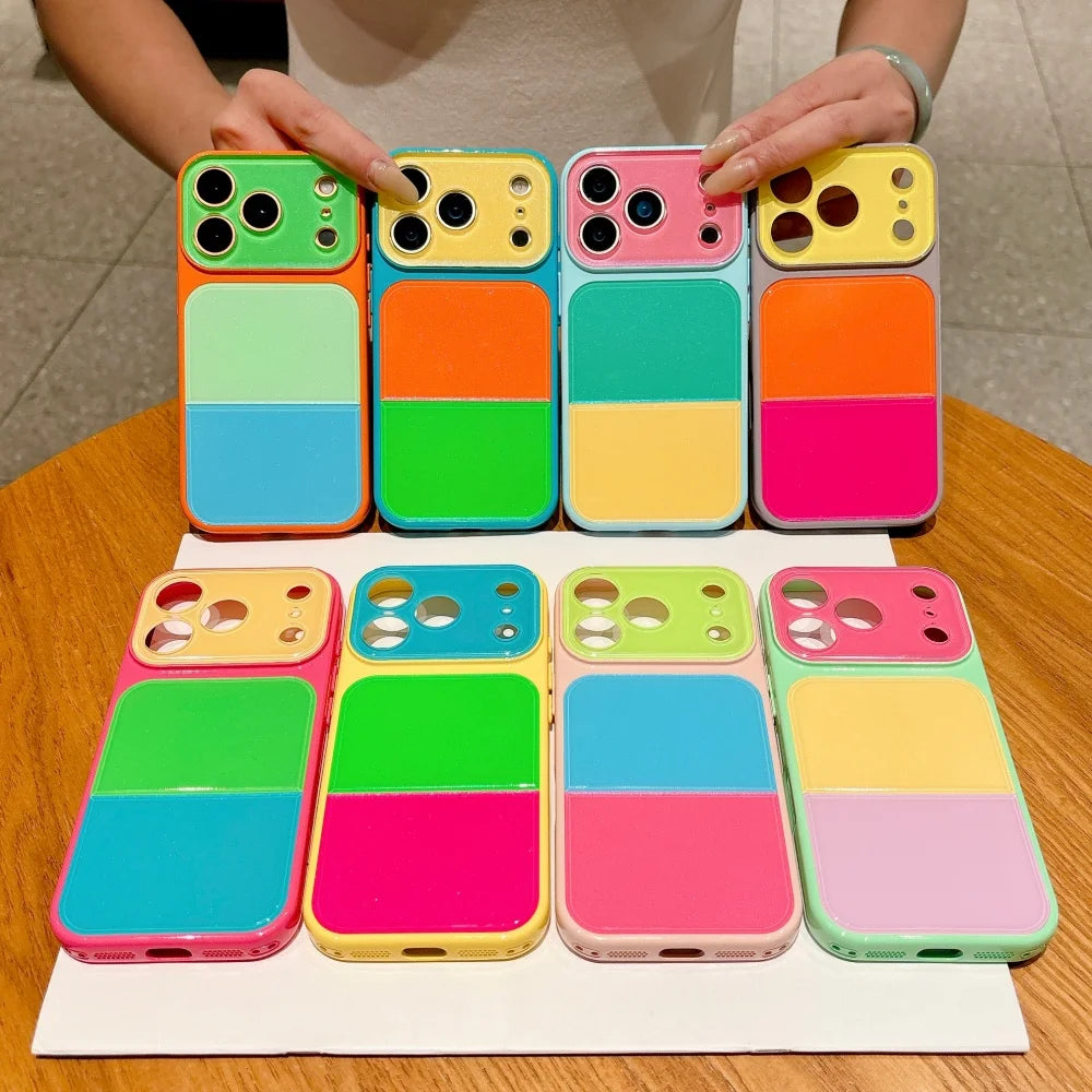 A collection of colorful block acrylic phone cases for an iPhone, arranged in a row.