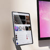 An extended monitor holder is shown supporting an iPad, allowing it to be used as an extra display.