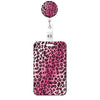 A pink leopard print retractable badge holder with a circular top.