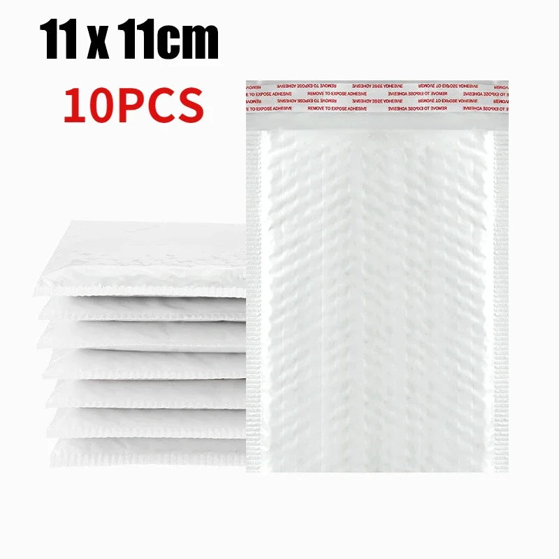 A pack of 10 self-sealing pearl film bubble shipping bags in white.