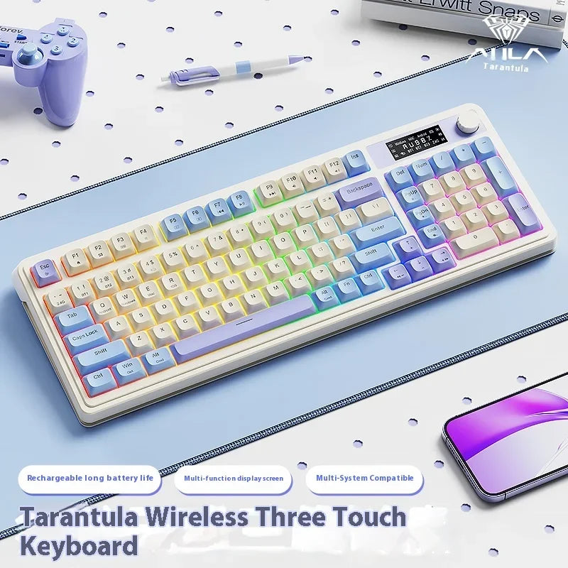 A white and purple wireless three-touch keyboard is shown on a blue surface with a smartphone nearby.