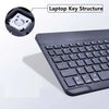 A close-up view of a laptop key structure and a black Bluetooth keyboard is shown.