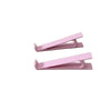 Ein Paar rosa ergonomischer Tastenhöhenverstellstrecker.