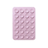 A pink silicone suction cup product featuring a grid of twenty-four round cups.