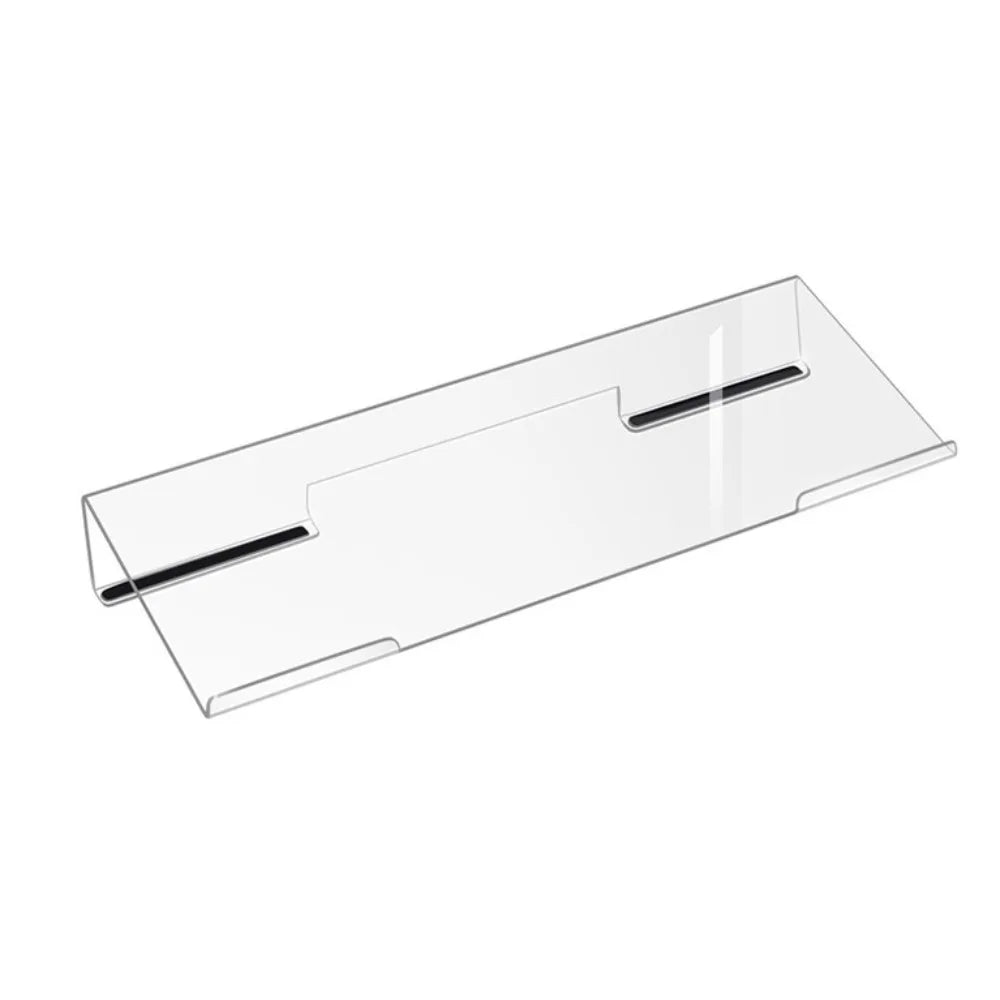 Clear acrylic keyboard riser stand with an ergonomic wrist rest for improved typing posture.