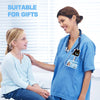 A female doctor in blue scrubs smiles while adjusting the ID badge holder for a young girl.
