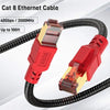 كابل إيثرنت أحمر لقطة مع موصلات RJ45 ملفوف على خلفية رمادية