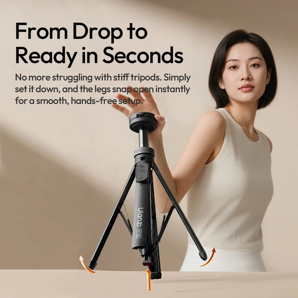 A woman demonstrates setting up a magnetic phone tripod quickly on a table.