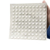 A clear silicone sheet with multiple round stickers designed for long nails.