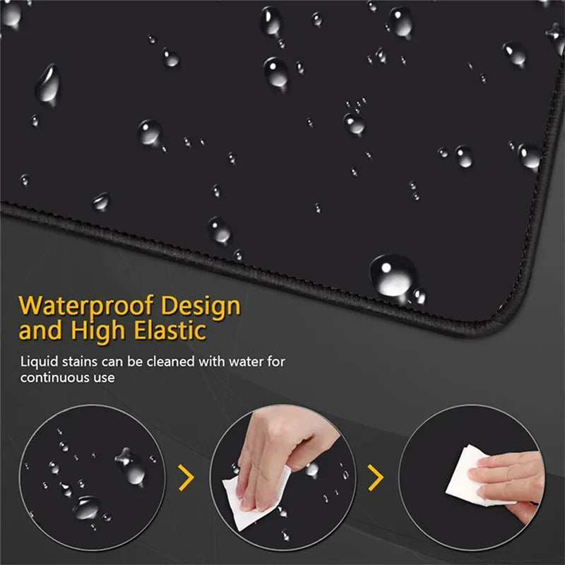 Black waterproof gaming mouse pad with a vibrant print showing liquid stains being cleaned with water