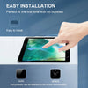 A hand is applying a tempered glass screen protector to an iPad screen, demonstrating easy installation.