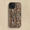 Coque de téléphone en silicone pour iPhone avec motif camouflage de forêt (branches et feuilles).