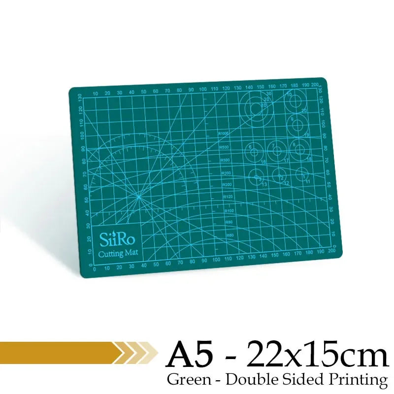 A green SiRo cutting mat with grid guides, double-sided printed, measuring 22x15cm.