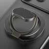 A close-up view of a magnetic phone stand with a kickstand designed for MagSafe and metal cases.